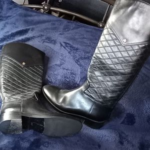 Gentle worn Tory Burch boots